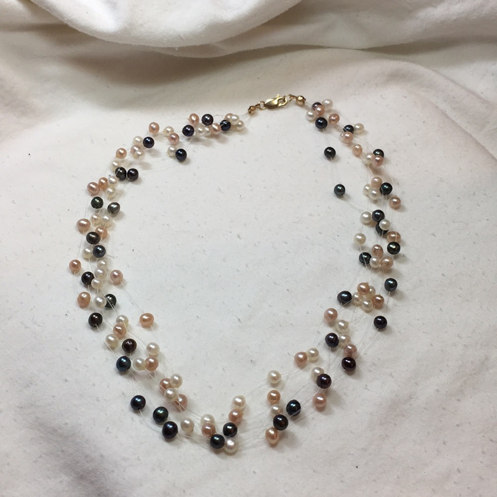 Delicate Pearl choker necklace.